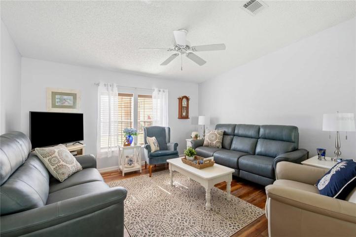 Living room is open with dining area.