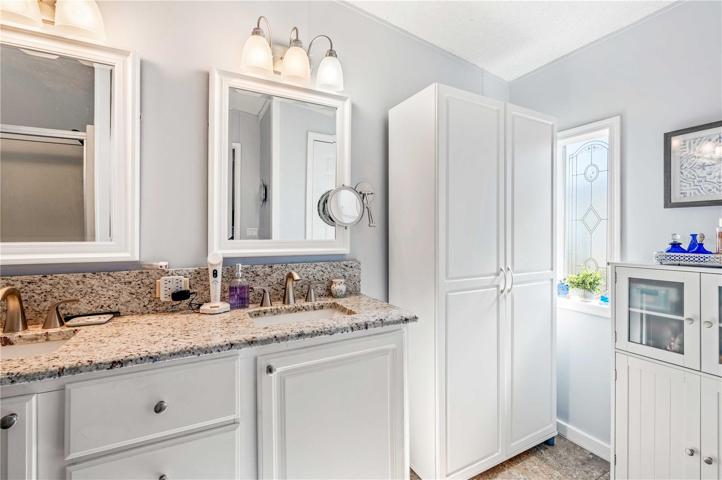 Updates include Granite double sink countertop, build-in closet, lighting fixtures, and fresh paint.