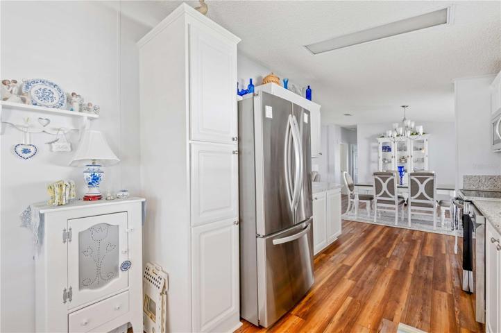 New stainless-steel appliances, flooring, Granite counter tops, fresh paint, and updated cabinets.