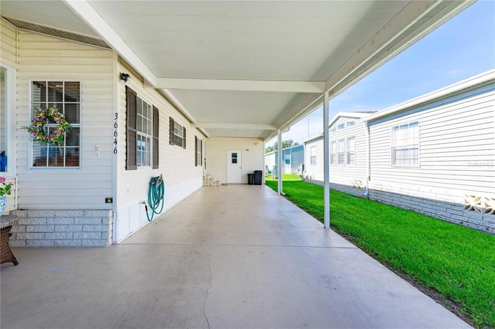 Oversized carport on this home.