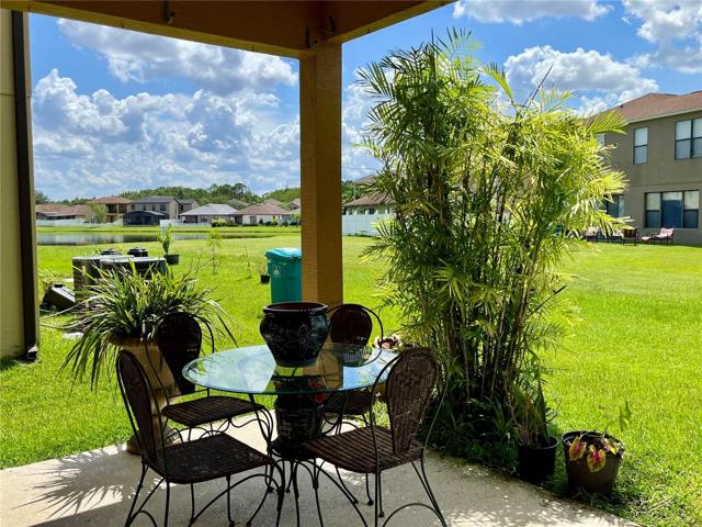 Lanai with a partial view of the pond