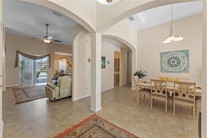 Entry with view of dining room and living room