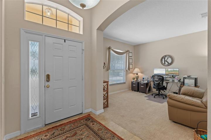Entry with view of office/formal living room