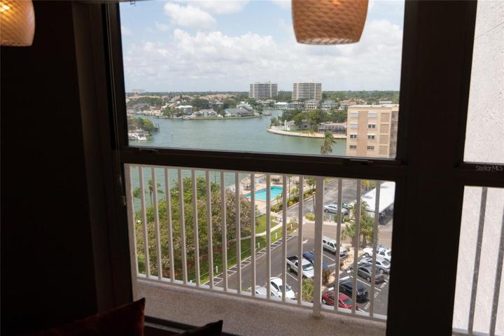 View from Custom Sitting Area Of the Intercoastal and Pool Area.