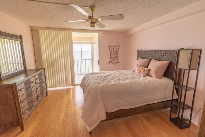 Master Bedroom w/ Bay Views & Balcony Access