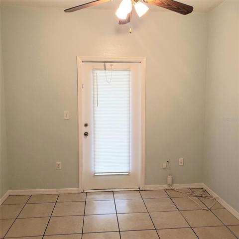 2nd bedroom with door to the patio