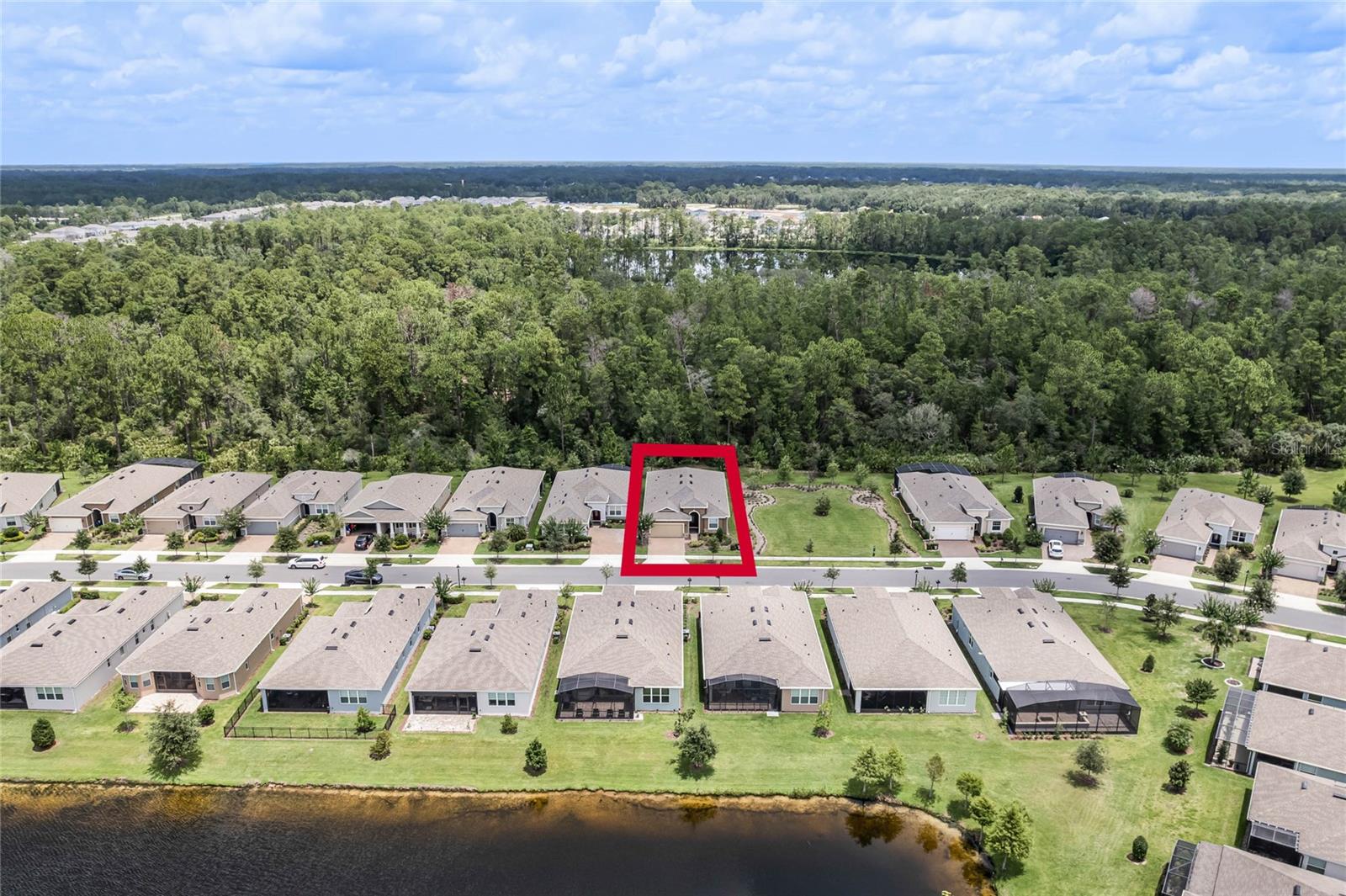 Aerial view with home's location indicated &amp; surrounding area