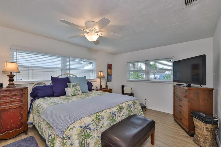 Master bedroom with walk-in closet and en-suite bathroom.