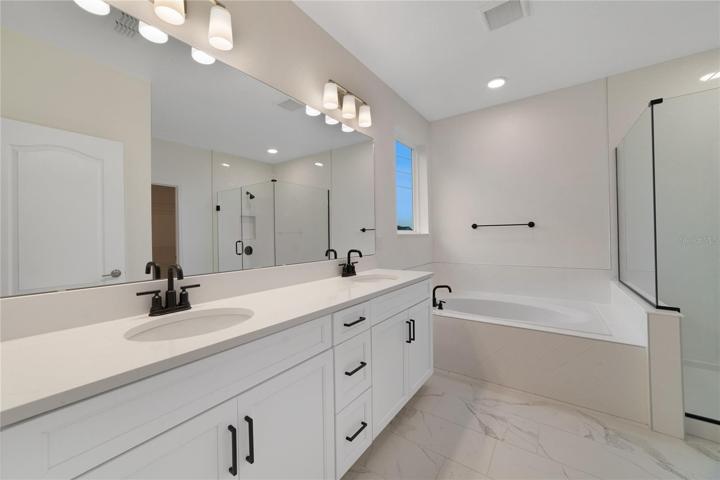 PRIMARY EN-SUITE BATH.