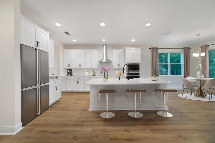 Thoughtfully designed with the utmost attention to detail, this home delivers the bright OPEN CONCEPT and upgrades dreams are made of! Furniture, accents and fridge are Virtually Staged.