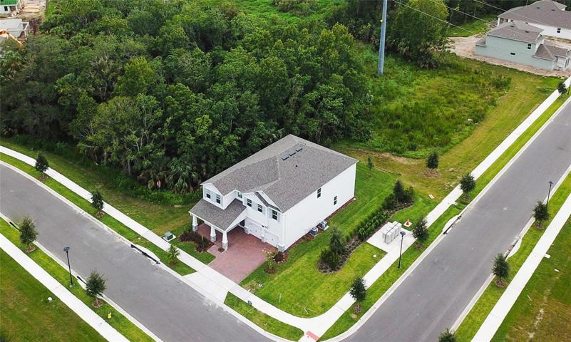 Situated on an AMAZING CORNER LOT with NO NEIGHBORS (rare!), this property boasts a serene CONSERVATION VIEW from your covered lanai and private balcony!