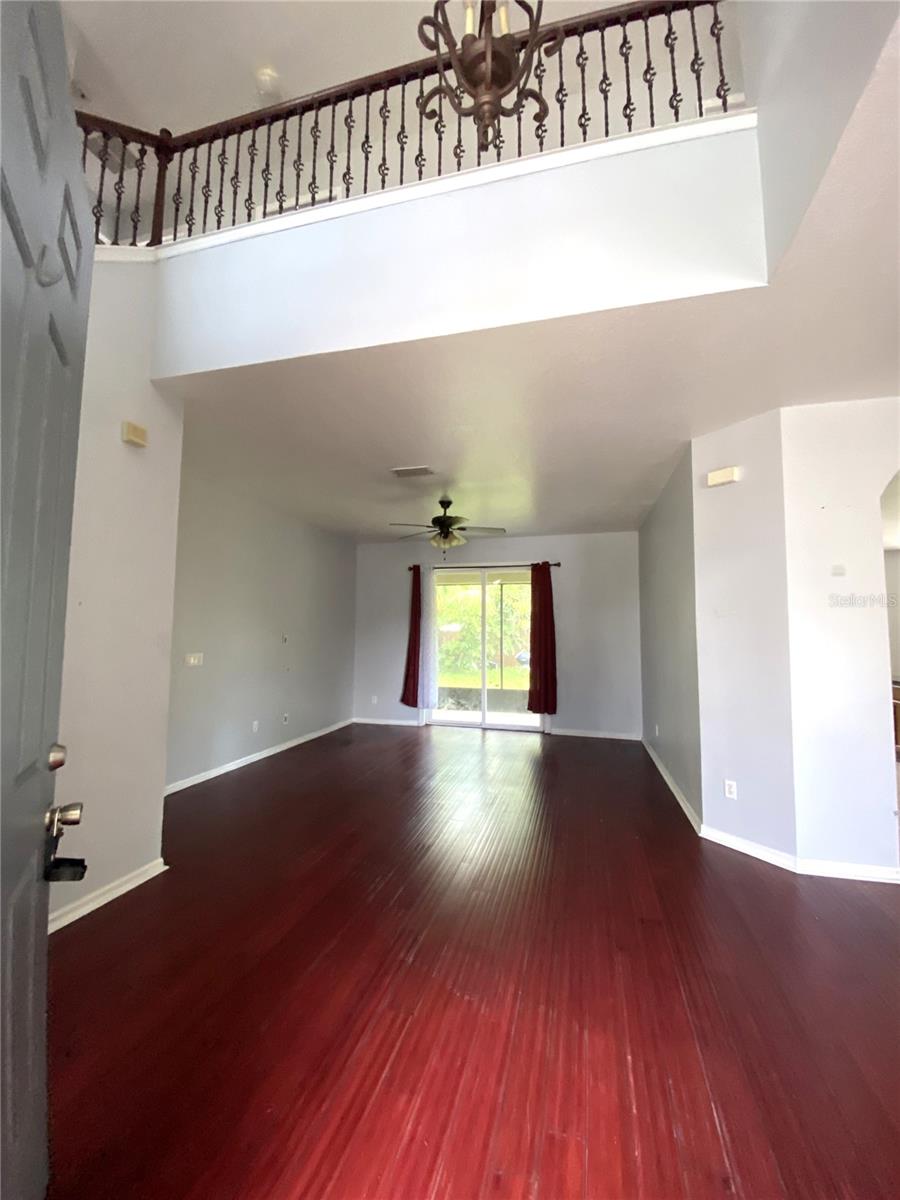 Living Room with slider doors that lead to rear lanai.