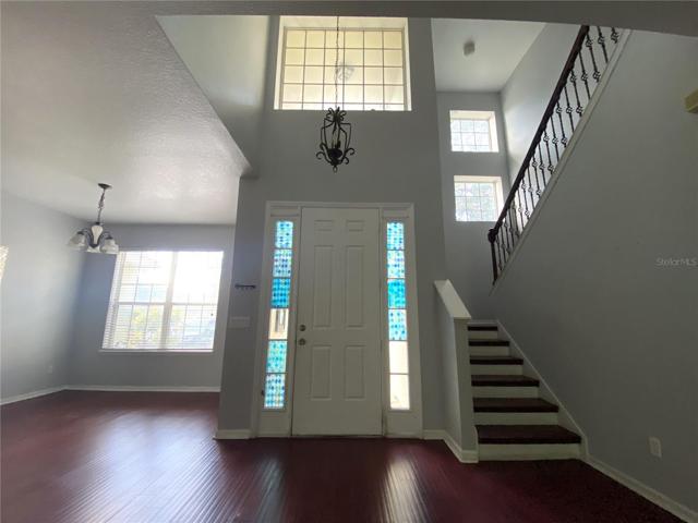 Front door, dining on left, stairs to upstairs 4 bedrooms and 2 baths