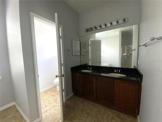 Toilet closet and double vanity in master bath