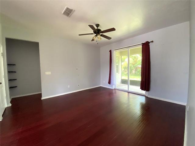 View from front door into living room. Hall to master on left.