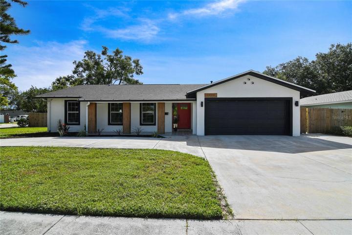 Beautifully updated Winter Park POOL HOME in the Casa Aloma community with a NEW ROOF, A/C and WATER HEATER in 2022, a 12x15 WORKSHOP/STUDIO - finished with A/C in the backyard and a light and bright OPEN CONCEPT centered by a GORGEOUS KITCHEN!