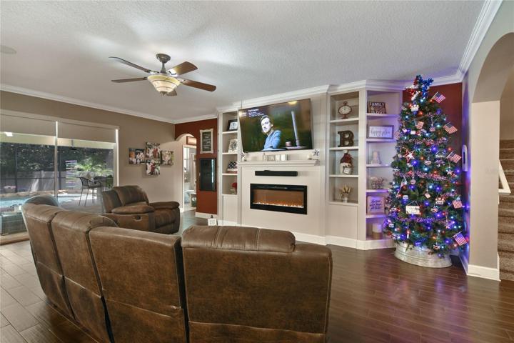 There is something to love around every corner in this home from the full BAR off the kitchen, wood accents, barn door, HUGE BONUS/LOFT and more!