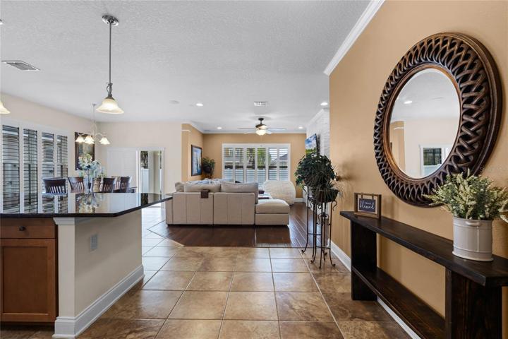 Ceramic TILE and WOOD floors run throughout your main living areas for easy maintenance with a modern feel!