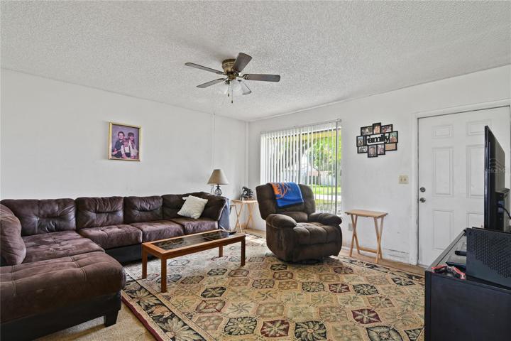 The living area has a large window for nice natural light and the dining space has sliding glass door access to the backyard!