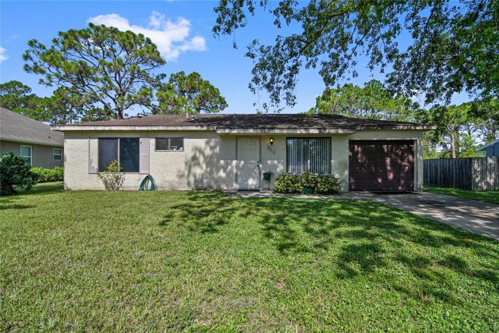 Tucked away in the Port Malabar community of Palm Bay you will find Clifton Road SE, just minutes from I-95 and the beach, making this home a perfect investment opportunity with a spacious backyard for room to expand or add an in-law suite!