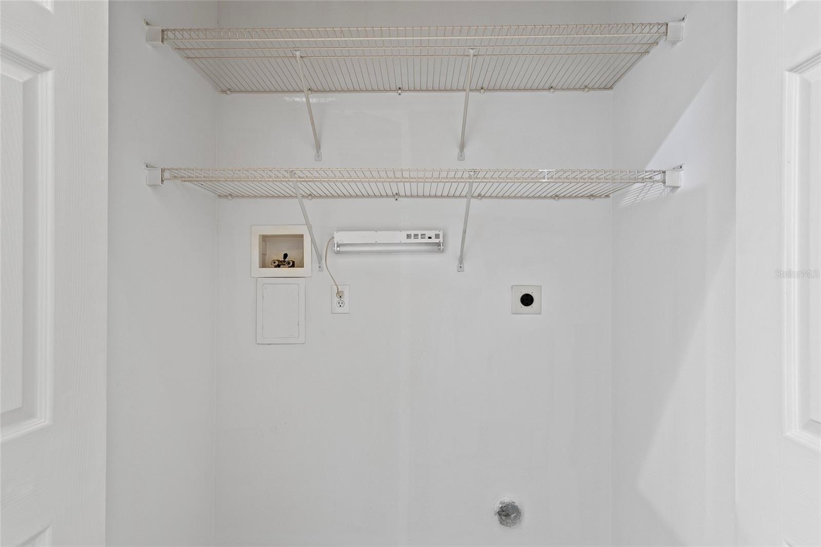 Laundry closet off kitchen