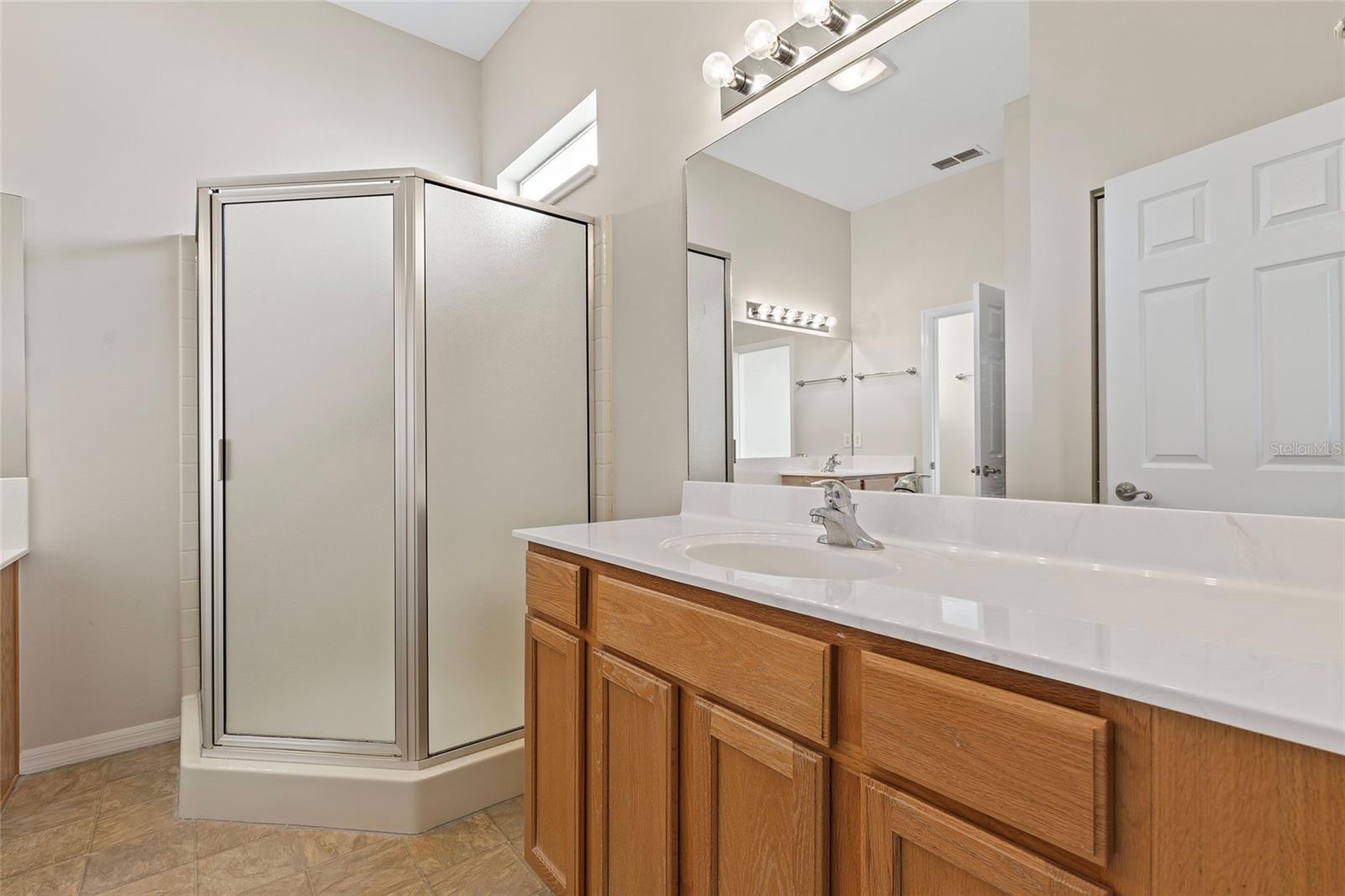 Master bath with dual vanities, shower