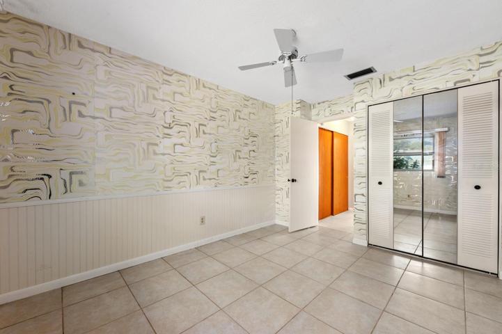 Guest Bedroom - wall was removed and drywall replaced after water leak