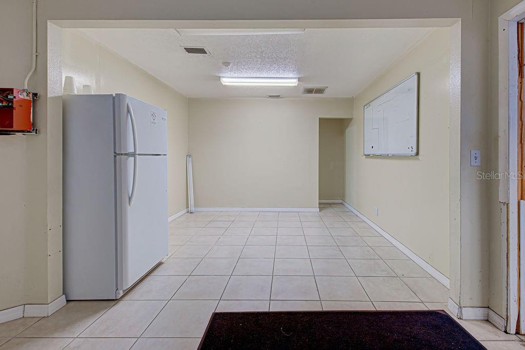 BREAK ROOM AND SECOND BATHROOM OF 3