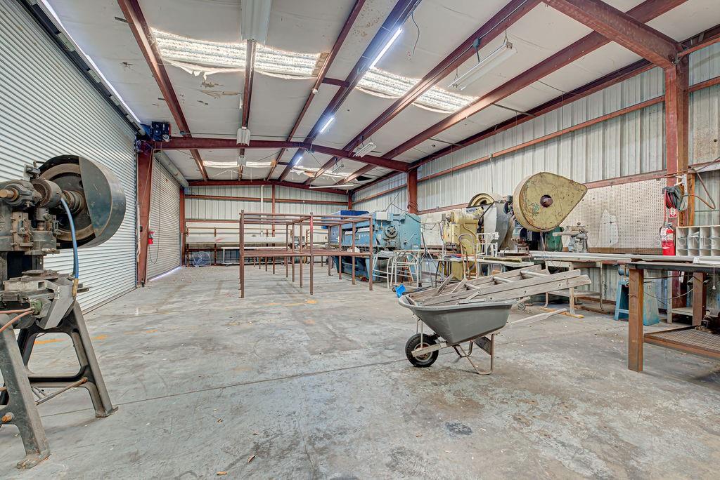 INTERIOR OF WAREHOUSE - 3 OVERHEAD DOORS (12X20)
