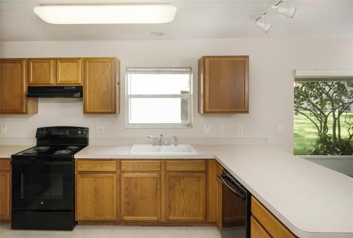 Kitchen view #1, looking out to slider