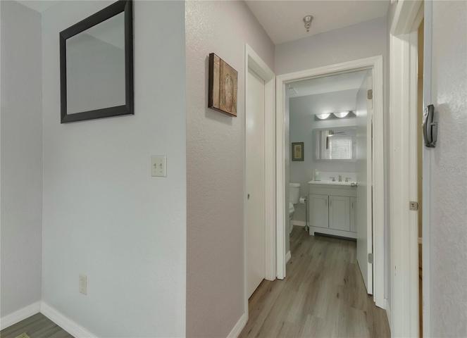 Master hallway w/ walk-in closet & bathroom