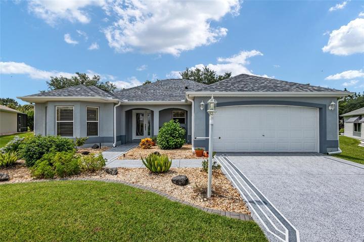 This completely updated Vera Cruz model in the Village of Santo Domingo offers the epitome of modern luxury with its 3 bedrooms and 2 baths, providing 1,900 square feet of beautifully remodeled living space.