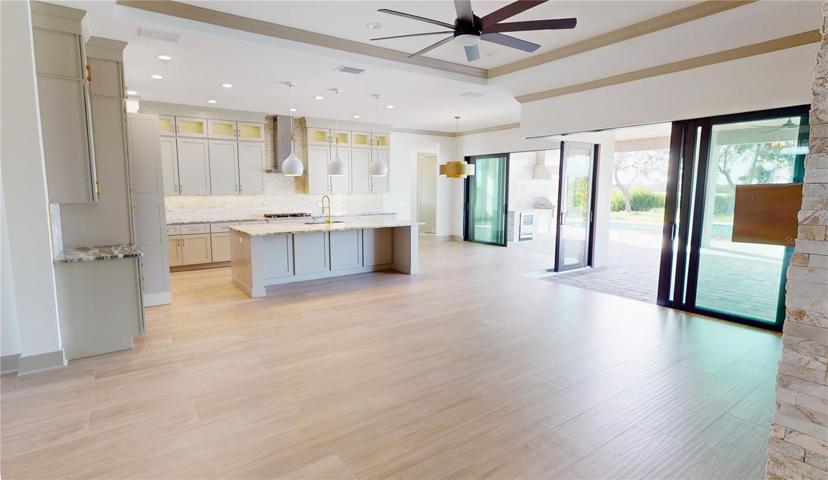 Great room, kitchen and dining area