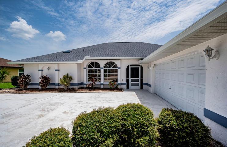 welcome home with with side entry garage, plenty of parking