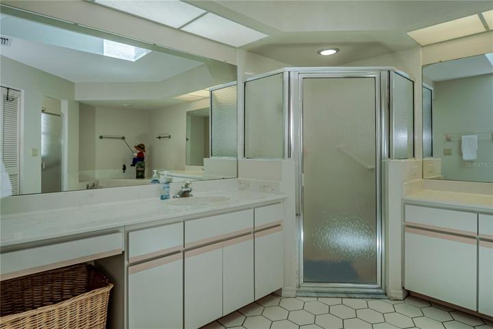 master bathroom with dual sinks