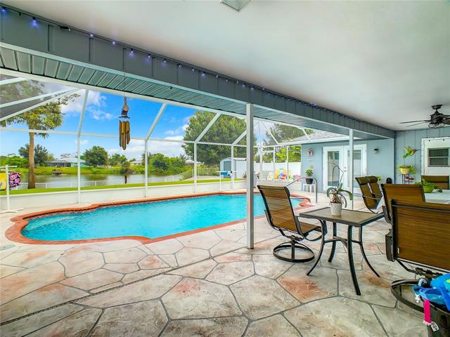 Fantastic Pool and Lake View. Sit and enjoy a glass of Wine and let enjoy why you are here in Paradise! Note the accent lighting above.