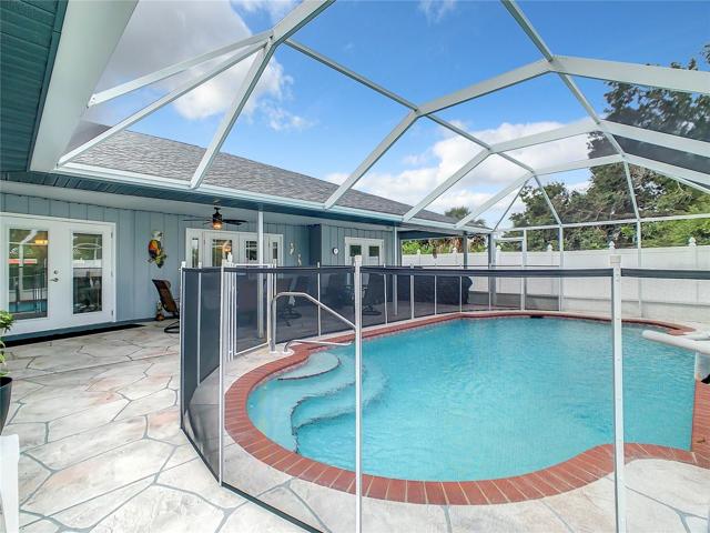 Removeable Child or Pet Safety Fence is included and has a custom gated entry that a child cannot push open. This will be stored in the garage for showings