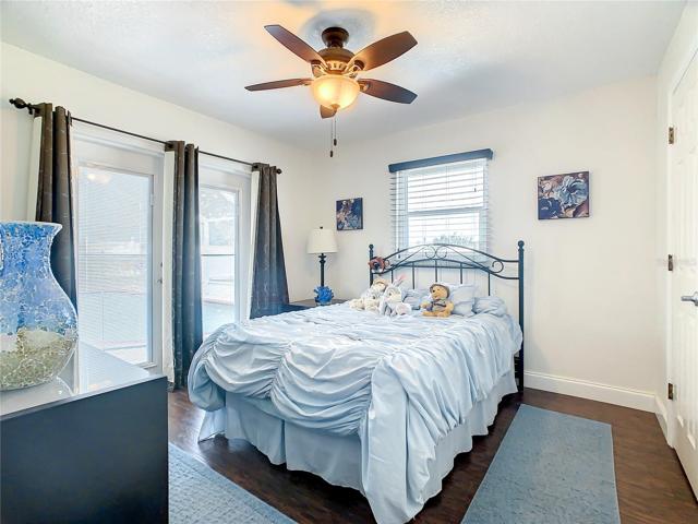 Bedroom #3 and Features a walk in closet and laminate flooring