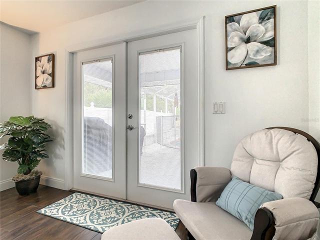 French Doors Hurricane Impact and Enclosed Shutters Master Bedroom.