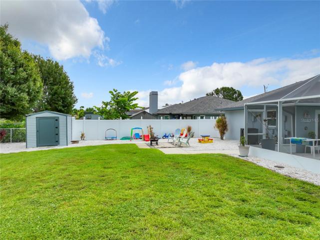 View of the back yard and outside patio