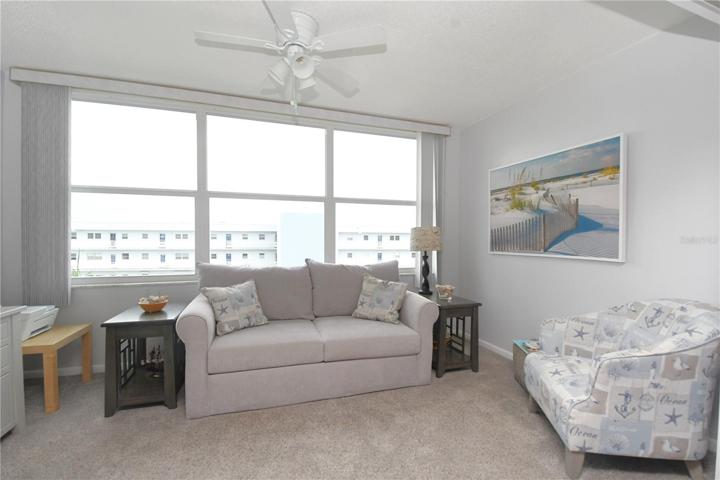 From here, you'll enjoy a partial view of the sparkling waters of Boca Ciega Bay as well as a delightful view of the inviting pool area.