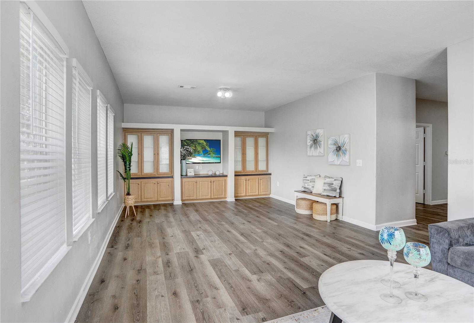 Huge Family Room with built-in cabinets.