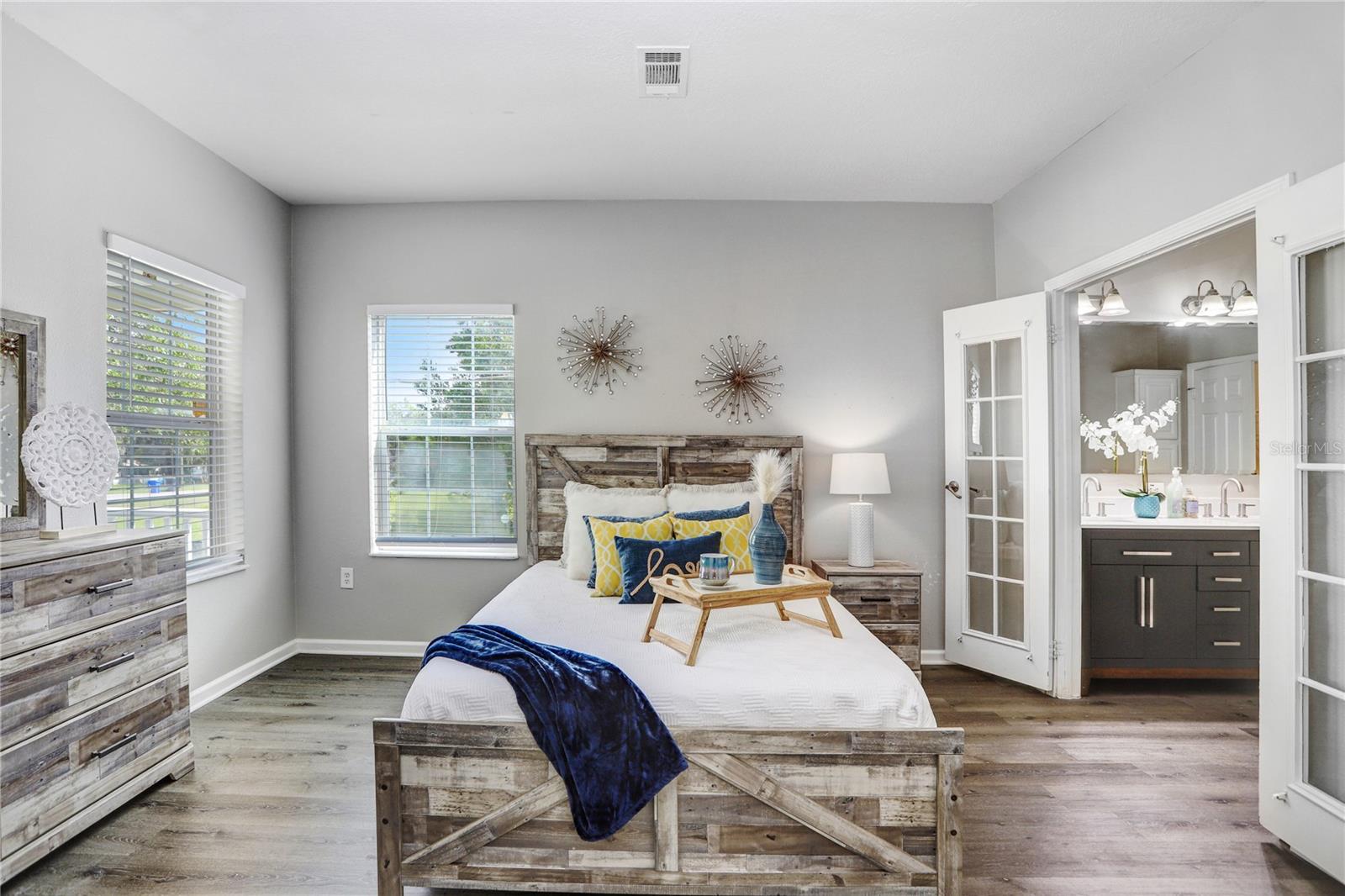 The master bedroom with french doors to the master on-suite!