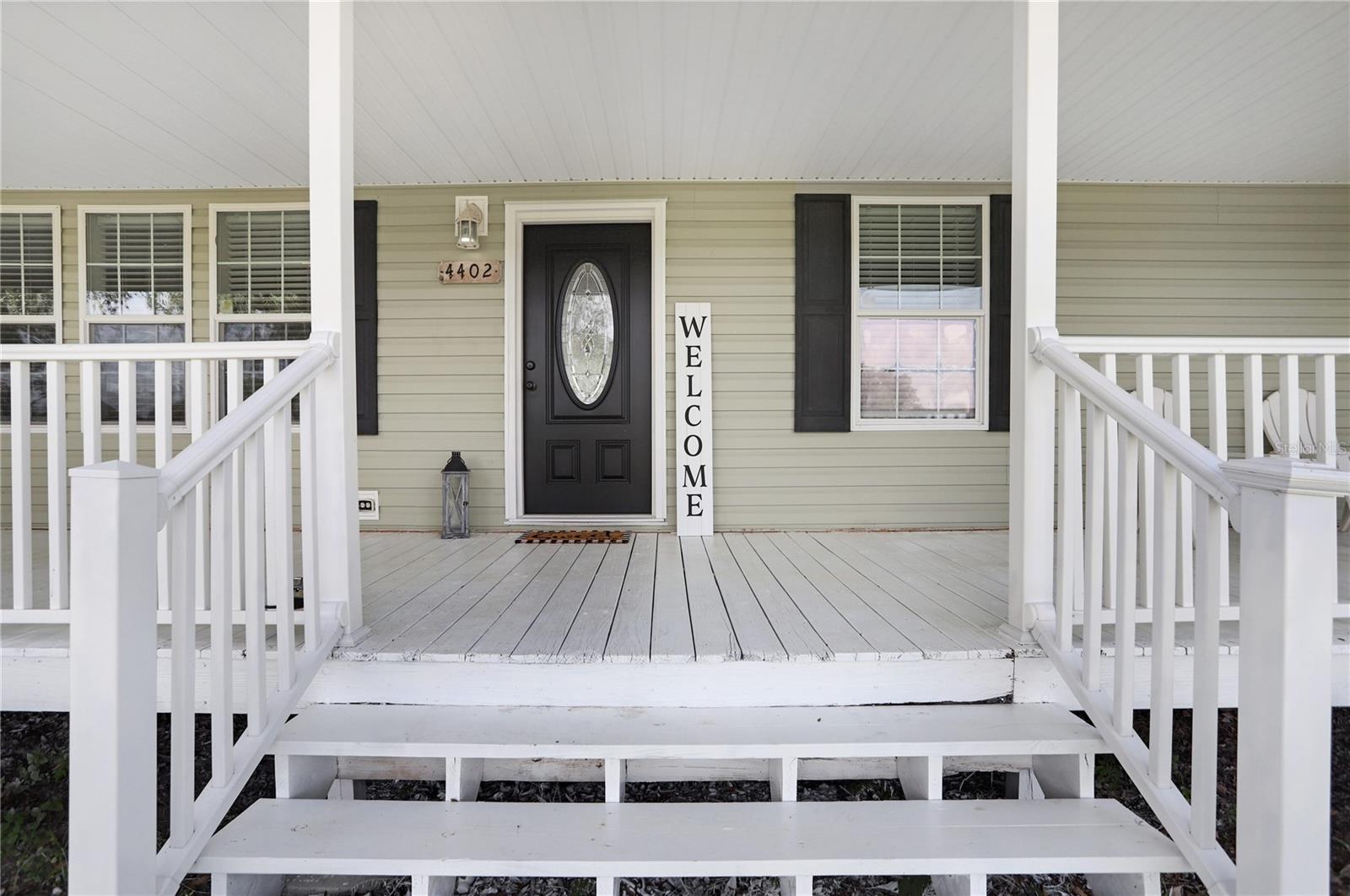 Welcome to this gorgeous home with an enormous porch to enjoy the sights and sounds of country living.