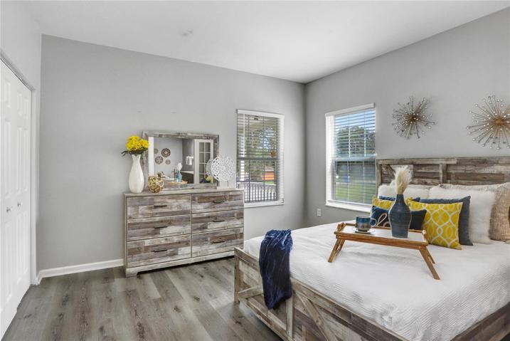The master bedroom has 2 sets of closets in the bedroom, and also a walk-in closet in the bathroom.