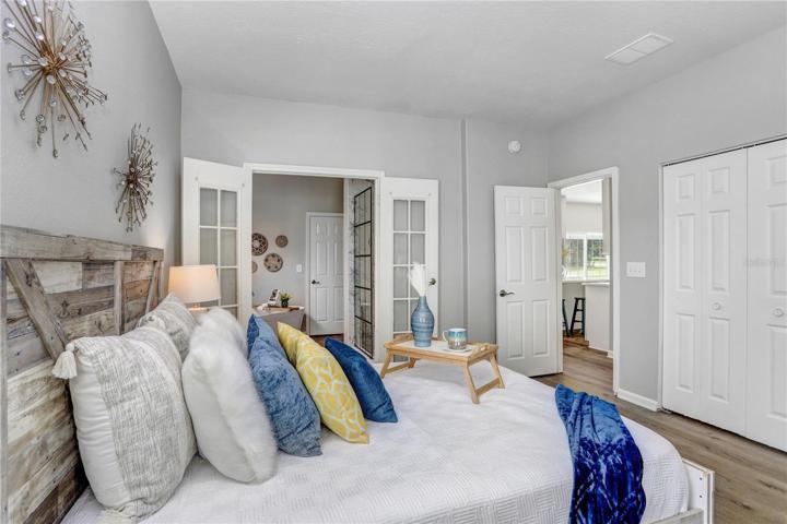 The master bedroom has 2 sets of closets in the bedroom, and also a walk-in closet in the bathroom.