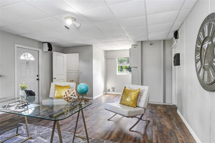 Detached office space with half bathroom.