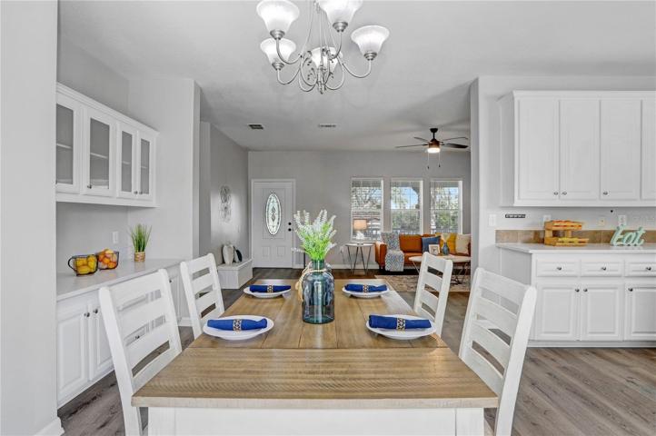 The kitchen is open to the dining space.