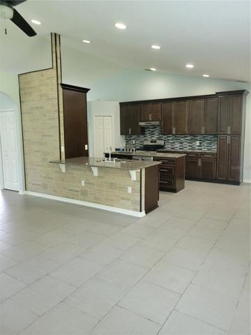 Dining room 2 island sink in kitchen