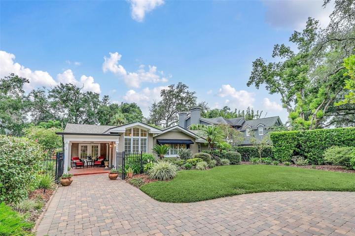 Brick paver Driveway with lovely covered front lanai